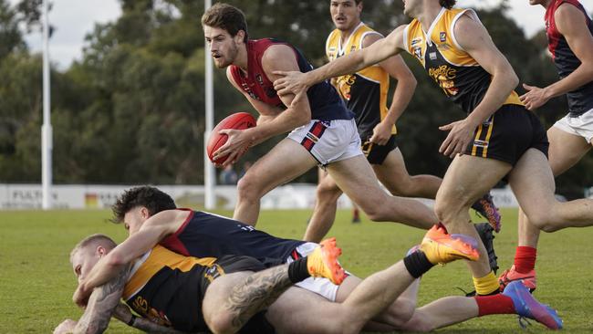 MPNFL: Mt Eliza’s Sam Mourney collects the loose ball. Picture: Valeriu Campan