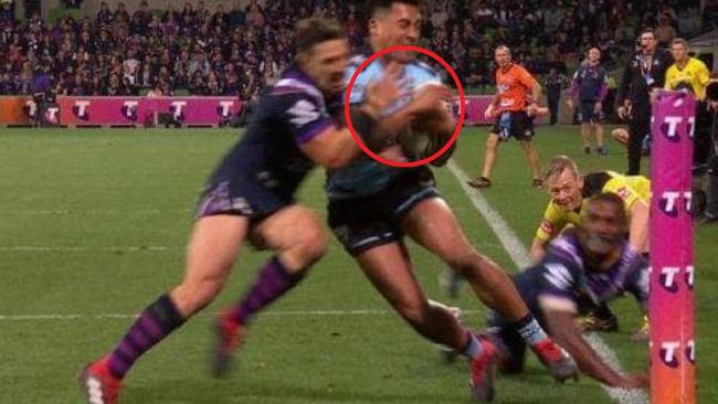 Image shows Billy Slater shoulder charge on Sosaia Feki