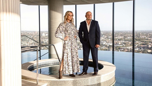 Larry Kestelman with wife Anita Pahor atop their Capitol Grand building in Melbourne. Picture: Nic Walker