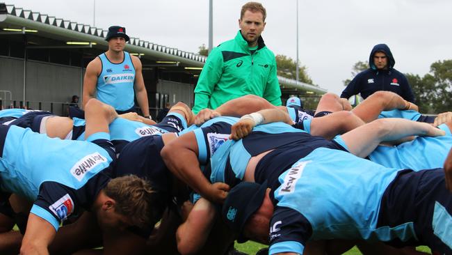 Referee Angus Gardiner watches over a Waratahs scrum session Credit: Waratahs media