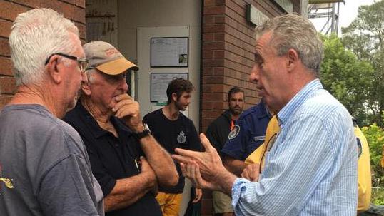 Page MP Kevin Hogan chats to flood-affected residents.