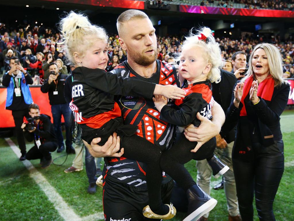 And with his kids, celebrating game 100, in 2018. Picture: Michael Dodge/Getty Images