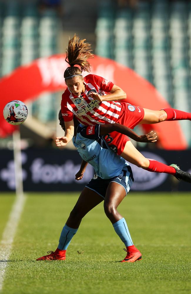 Rebekah Stott leaps over Princess Ibini-Isei. Picture: Getty