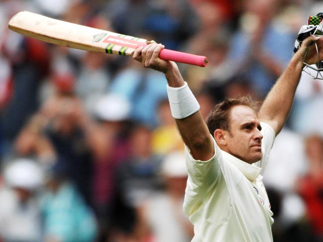 **FILE** A Dec. 27, 2006 file photo of Australia's Matthew Hayden acknowleding the crowd as he walks from the field  for 153 on day 2 of the 4th Ashes Test at the MCG, Melbourne. Hayden announced his retirement from international cricket today, Tuesday, Jan. 13, 2009. (AAP Image/Dean Lewins) NO ARCHIVING, EDITORIAL USE ONLY, NO COMMERICAL USE, NO SALES, MOBILES OUT