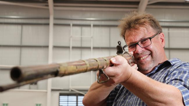 Appraiser Richard Macdonald has his eye on an Arabian Flintlock Musket worth $800. Picture Glenn Hampson