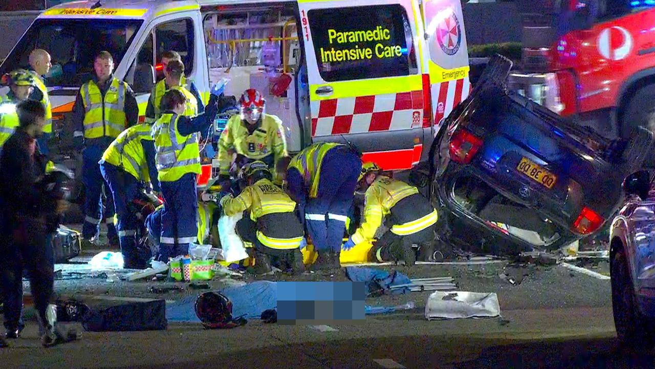 A horror road toll has seen 17 people die in 12 days across NSW roads. Two people died in Greenacre on Tuesday night after a motorcycle collided with a car. Picture: TNV