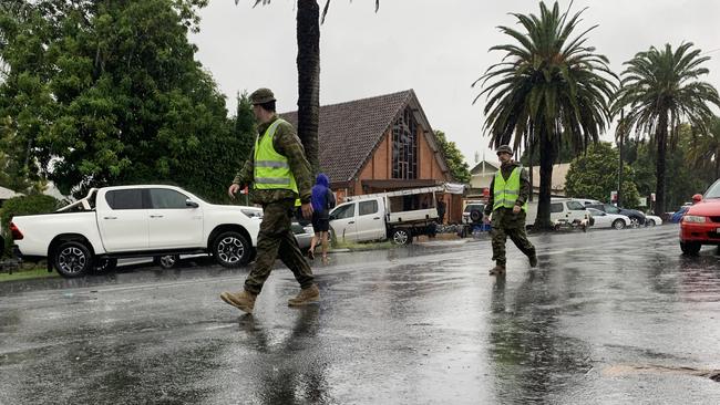 Army troops arrive in Lismore to assist with flood rescues. Picture: Stuart Cumming