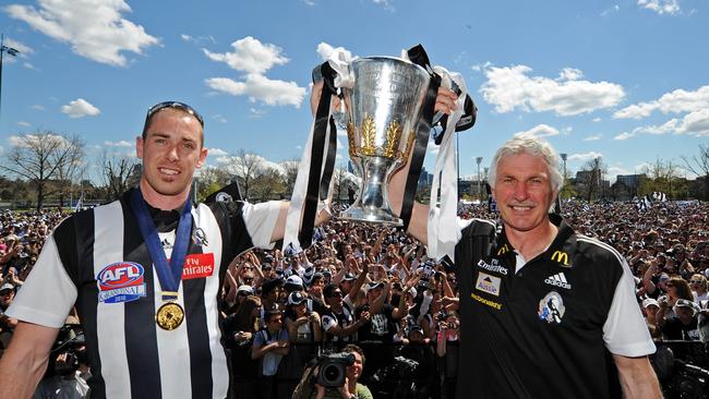 Nick Maxwell and Mick Malthouse with the 2010 premiership cup.