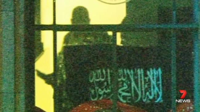 The Shahada was displayed during the Lindt cafe siege, but the young man says it is misrepresented by IS.