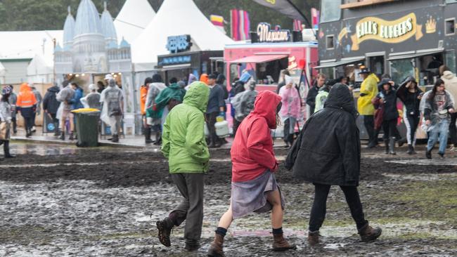 Festival-goers are seen in the mud at Splendour in the Grass 2022 on July 22, 2022 in Byron Bay, Australia. Picture: WireImage