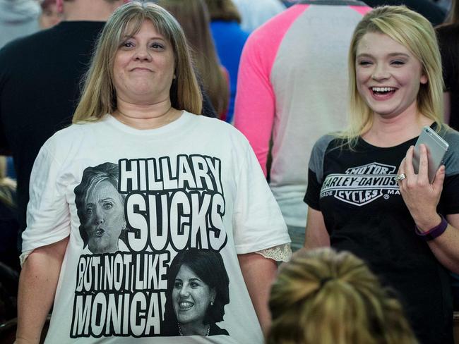 A woman shows off her shirt while waiting for US Republican Presidential candidate Donald Trump. Picture: Brendan Smialowski