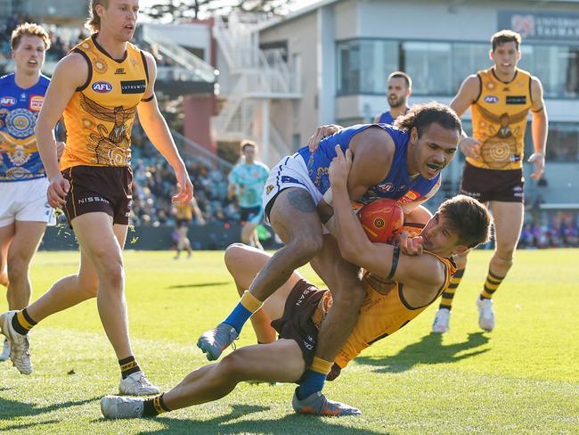 Jamaine Jones of the Eagles is injured in a tackle from Sam Butler of the Hawks at UTAS Stadium on Sunday. (Photo by Dylan Burns/AFL Photos via Getty Images)