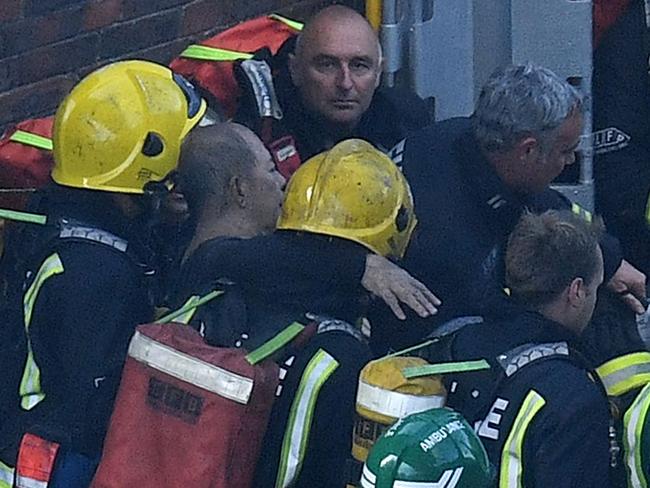 Man seen waving jumper from Grenfell window is rescued after being trapped  in burning building for 12 hours - Mirror Online