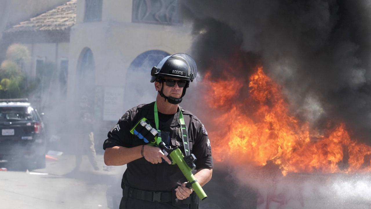 Police officers are involved in a tense stand-off with protesters. Picture: AP Photo/Ringo H.W. Chiu