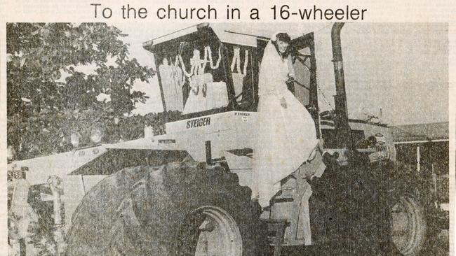 File photo of Gail Quin stepping down from a Steiger 8 wheel tractor with the help of her father Vince Quin on her wedding day on June 27, 1981. Gail Quin was married to Warren Jonsson at Our Lady Help of Christian church, Earlville, with a convoy of tractors escorting the bride, groom and bridal party to the church. PICTURE: RUSSELL FRANCIS