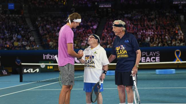 German tennis star Alexander Zverev meets tennis players Leonid Stanislavskyi of Ukraine (L) and Henry Young of Australia (R) during the Tennis Plays For Peace event. Photo: Morgan Hancock/Getty Images