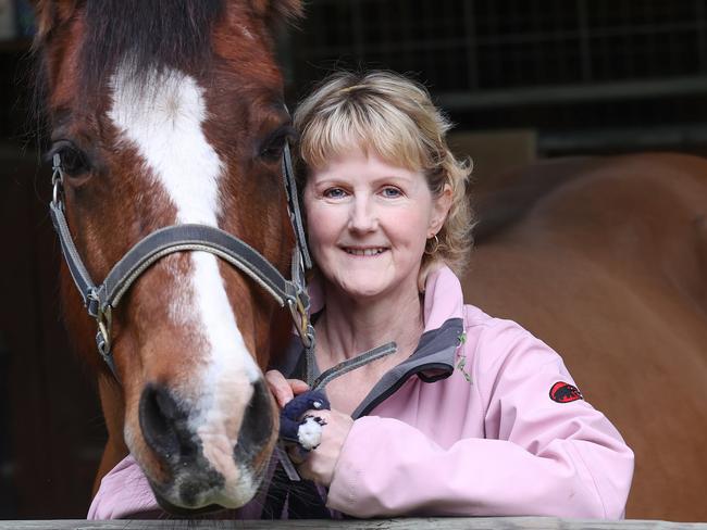 NETWORK USE ONLY>PLEASE CONTACT PIC DESKMichelle Le Grew for our upcoming story on tens of thousands of Aussies paying for their own cancer treatment.Michelle aged 58 lives in Yarra Valley. She has the BRCA2 genes. Its costing her $90,000 a year to pay for treatment not on the PBS.Pics with her  horse Max .Pictures Andrew Tauber