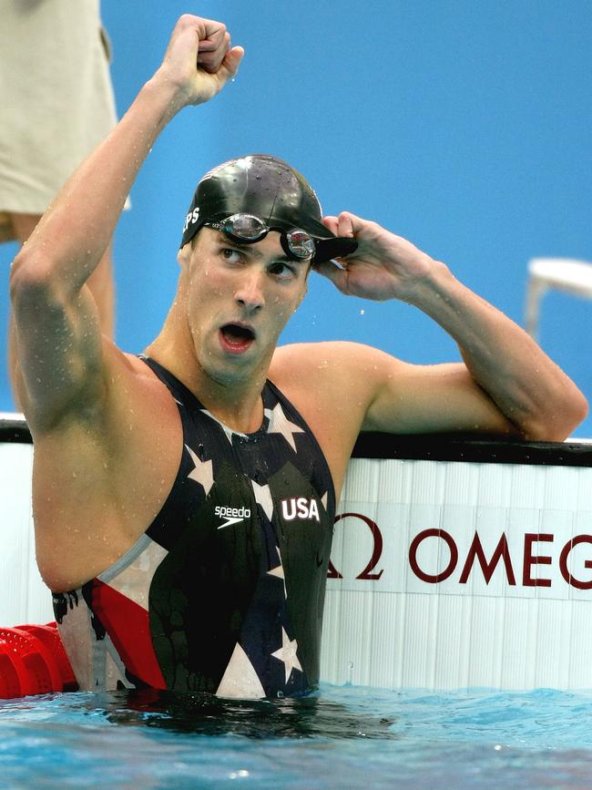 Michael Phelps won a record eight gold medals at the Beijing Olympics since banned high-tech swimsuit known as the super-suit. (Photo by Jed Jacobsohn/Getty Images)