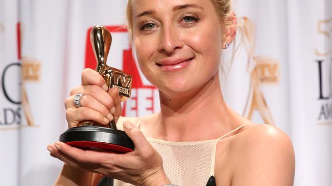 MELBOURNE, AUSTRALIA - APRIL 07: (EDITORS NOTE: Image embargoed until award broadcast by Network Nine) Asher Keddie celebrates in the awards room after winning the Gold Logie for Most Popular Personality on Australian Television at the 2013 Logie Awards at the Crown Palladium on April 7, 2013 in Melbourne, Australia. (Photo by Scott Barbour/Getty Images)