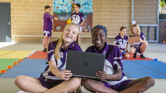 Students Olivia Strandberg and Bentiu Pakbat Brisbane Bayside State College in Wynnum. Picture: Richard Walker