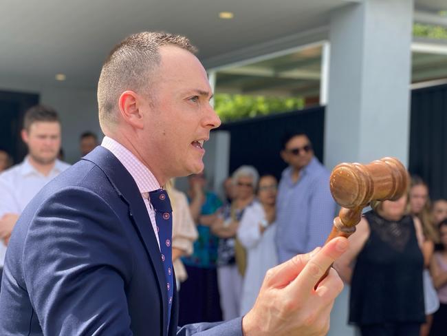 Avenue Auctions director and auctioneer Andrew Cooley at the sale of a house in Caringbah on February 20, 2021. NSW real estate.