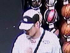 Police are looking to speak with this man in relation to an alleged theft at a sports store. Picture: QPS