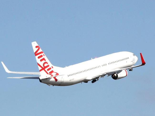 General scenes of Gold Coast Airport .Qantas ,  Jetstar , Virgin , Scoot , RAAF tanker , Terminal .