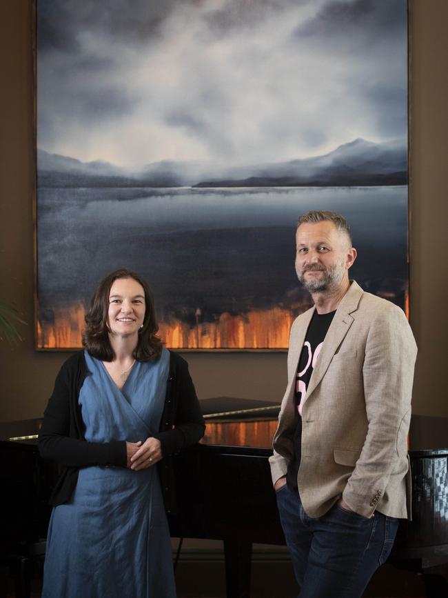 Entries are open for the 2024 Hadley’s Art Prize. Curator Amy Jackett and Tasmanian judge Neil Haddon with the 2023 Peoples Choice Winner: Joshua Andree’s Once Still Water (Requiem for a Lake). Picture: Chris Kidd