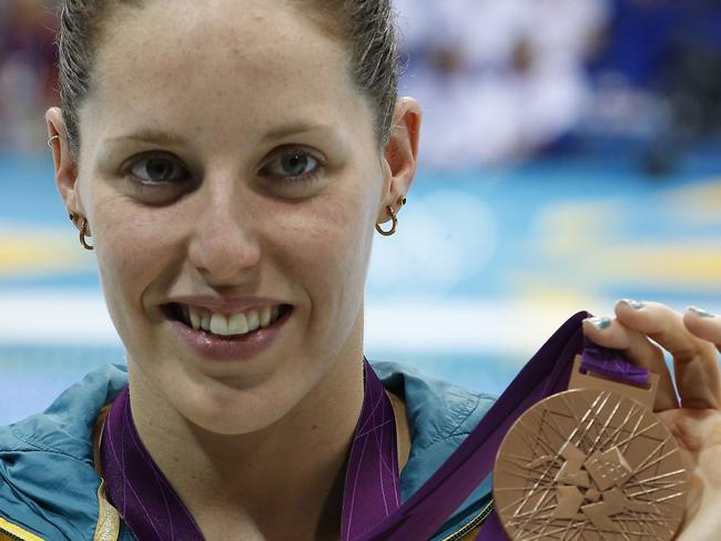 epa03325348 Australia's Alicia Coutts with her bronze medal after placing third in the women's 100m Butterfly final at the London 2012 Olympic Games Swimming competition, London, Britain, 29 Juy 2012. EPA/BARBARA WALTON