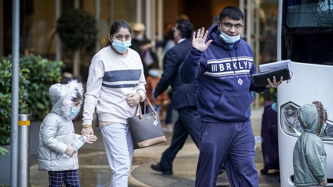 Passengers from an overseas flight leave the the Pullman Adelaide hotel after spending two weeks in quarantine. Picture: Mike Burton