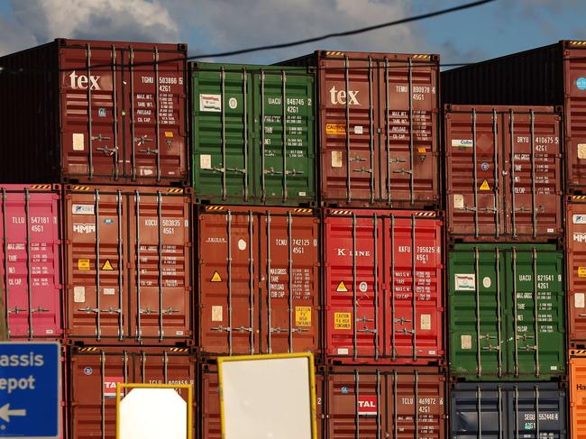 NEW JERSEY - JUNE 09: Shipping containers sit stacked in a port on June 09, 2022 in Bayonne, New Jersey. As consumer buying patterns gradually return to pre-pandemic norms, the global shipping business is seeing a fall in the cost of shipping container rates. Container shipping rates from Asia to both the East and West Coast of America are down over 30 percent from highs last September. Many retailers are dealing with extra inventory as consumers increasingly shift to spending money on travel, leisure and eating out. (Photo By Spencer Platt/Getty Images) == FOR NEWSPAPERS, INTERNET, TELCOS & TELEVISION USE ONLY ==