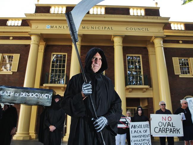 Members of the Save Manly Oval Alliance protested the ‘death of democracy’ outside Manly Council Chambers after being locked out of a meeting. Picture: Braden Fastier