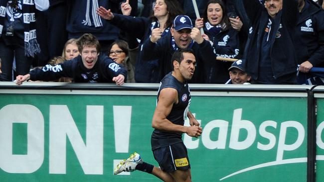 Eddie Betts celebrates a goal at the MCG in 2011.