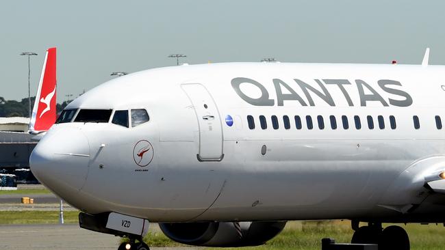 Qantas has suspended all international flights and will stand down two-thirds of its workforce until the end of May. Picture: AAP