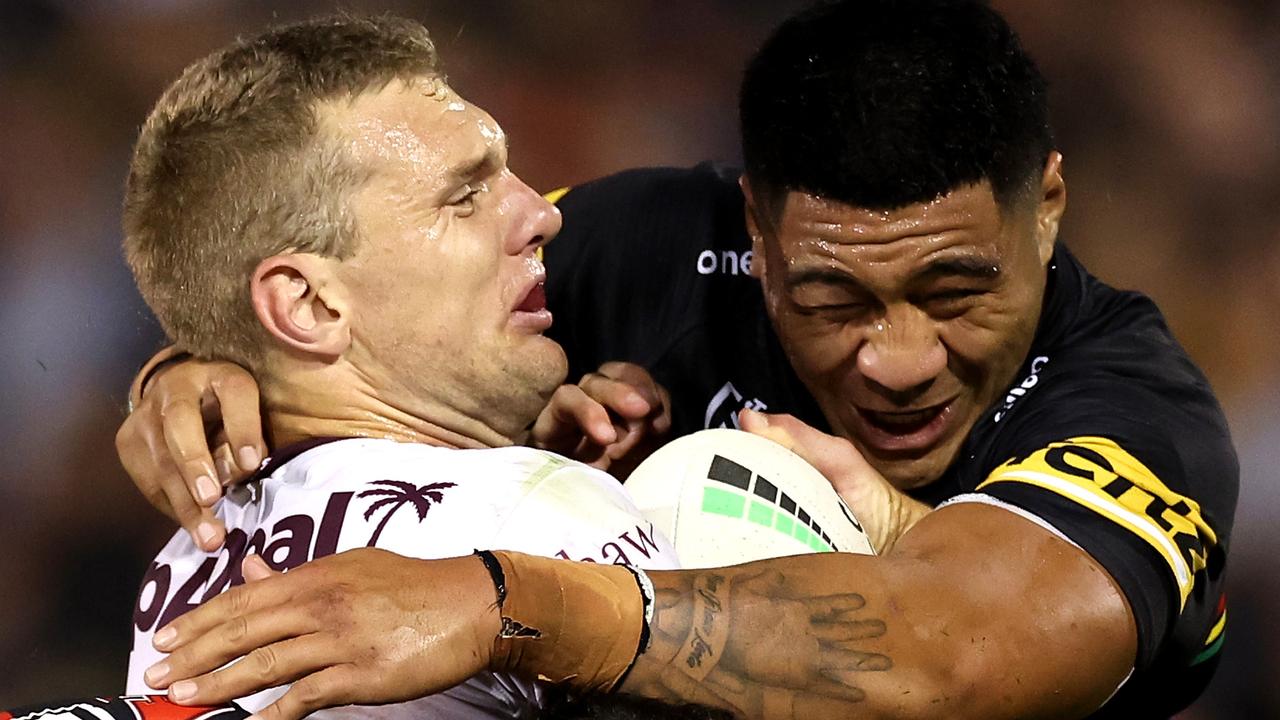 Tom Trbojevic feels the squeeze of the Panthers. (Photo by Cameron Spencer/Getty Images)