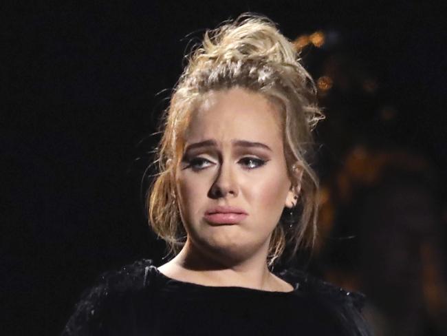 Adele got a second go at her George Michael tribute - but looked heartbroken after she’d finished. Picture: Matt Sayles/Invision/AP