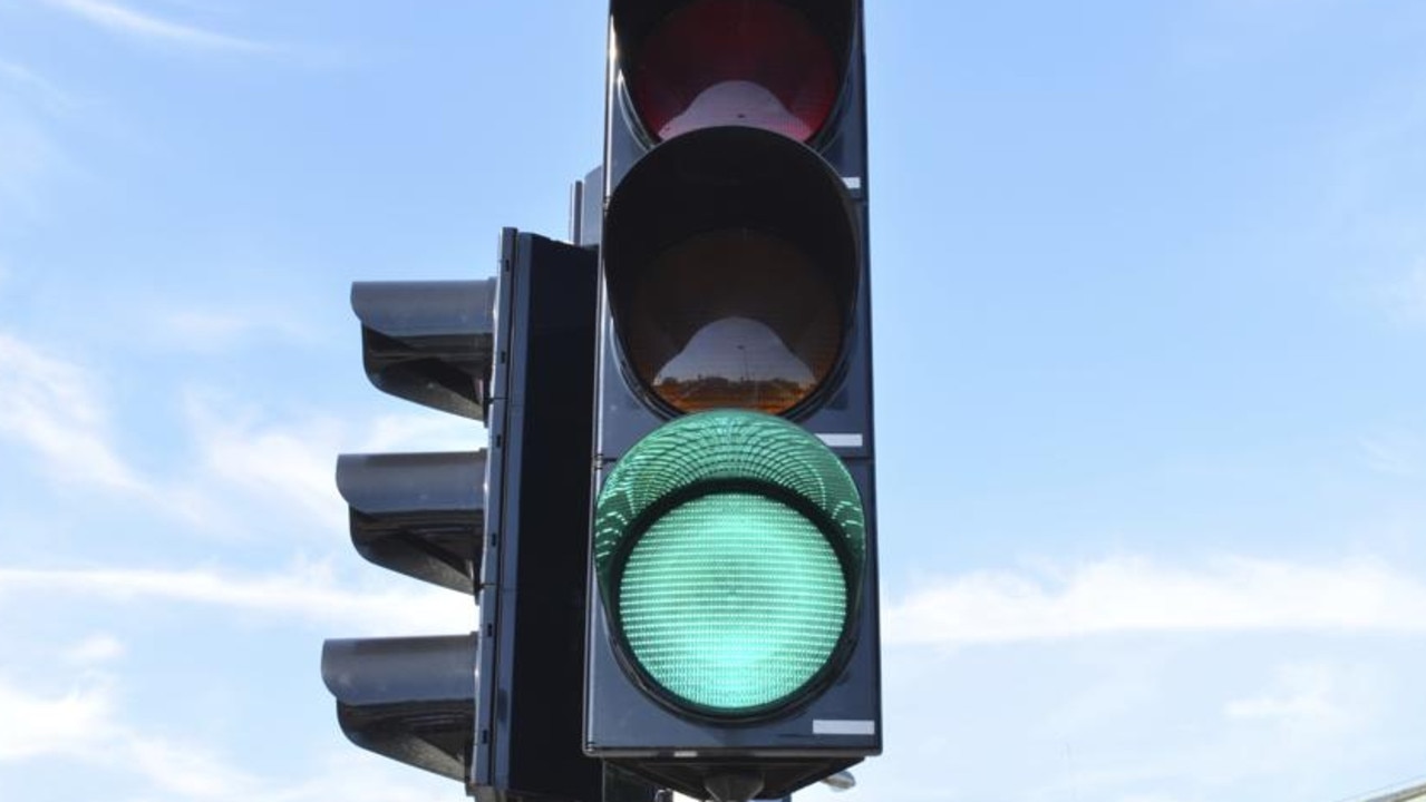 Sydney traffic lights already automatically turn green for late-running buses.