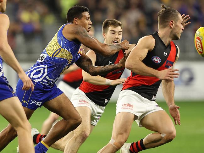 Tim Kelly was felled by a Zach Merrett tackle. Picture: Getty Images