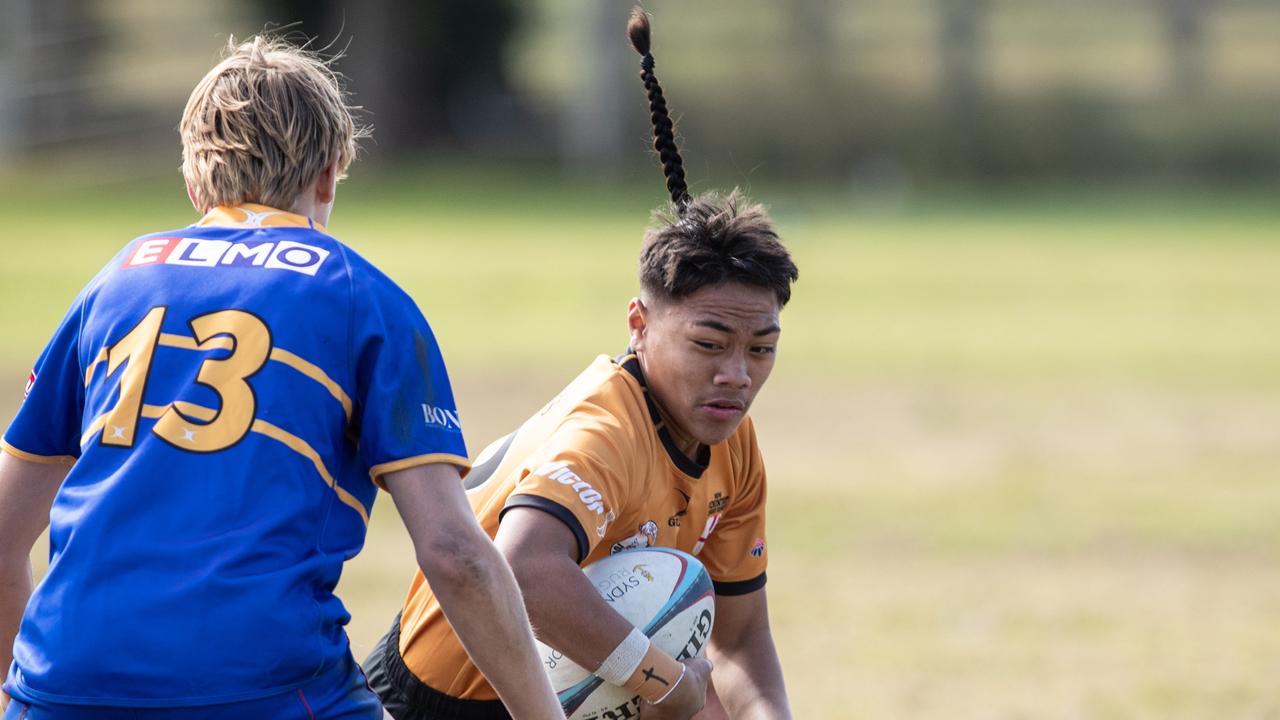 Country’s Tukia Fotu-Moala is tackled by Sydney’s Archie Hartman. Picture: Julian Andrews