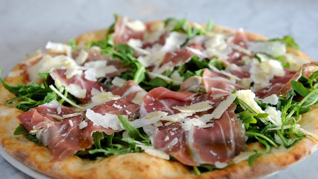 Prosciutto, rocket, parmesan and fresh basil pizza at Antica Pizzeria e Cucina