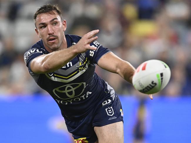 TOWNSVILLE, AUSTRALIA - JULY 06: Reece Robson of the Cowboys passes the ball during the round 18 NRL match between North Queensland Cowboys and Manly Sea Eagles at Qld Country Bank Stadium, on July 06, 2024, in Townsville, Australia. (Photo by Ian Hitchcock/Getty Images)