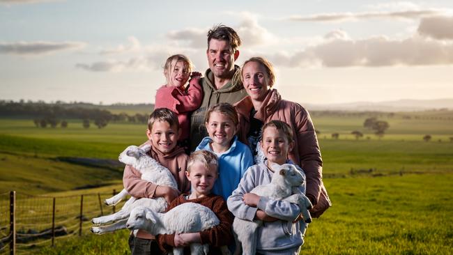 Ben and Kerry Heinrich with their children Archer 9, Emmison 10, Macartney 4, George 6 and Fredrick 8 on their Black Springs property. Picture Matt Turner.