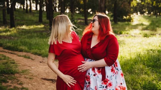 Nicole with surrogate Jaide. Jaide lives in Victoria and delivered baby Victoria in November 2022 for her best friends Nicole and Dan, who live interstate. Varying laws surrounding surrogacy across the country meant Victoria was legally Jaide's for four months, despite her having no genetic connection to the child. Picture: Supplied