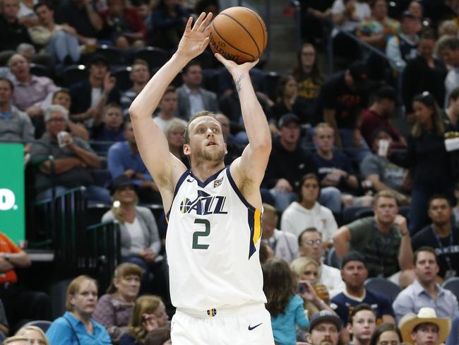 Utah Jazz forward Joe Ingles (2) shoots a 3-pointer against the Toronto Raptors in the second half during an NBA preseason basketball game Tuesday, Oct. 2, 2018, in Salt Lake City. (AP Photo/Rick Bowmer)