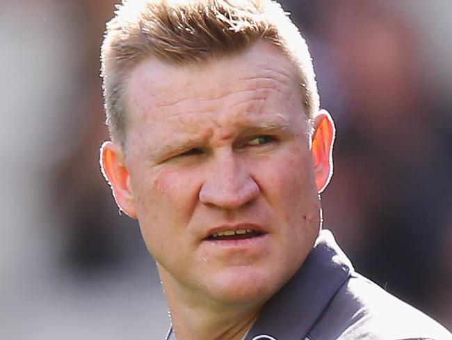 MELBOURNE, AUSTRALIA - MAY 28:  Magpies head coach Nathan Buckley with Levi Greenwood during the round 10 AFL match between the Collingwood Magpies and Brisbane Lions at Melbourne Cricket Ground on May 28, 2017 in Melbourne, Australia.  (Photo by Michael Dodge/Getty Images)