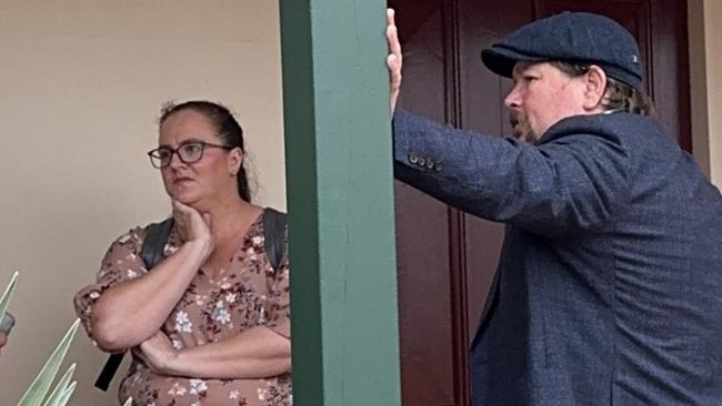 Rebecca and Robert Allan with their defence attorney outside Ballina Local Court on Monday.