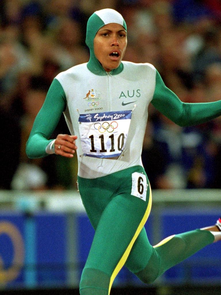 Cathy Freeman crosses the line to win gold in the Women’s 400m final at the Sydney Olympics. Picture: Mike Powell /Allsport