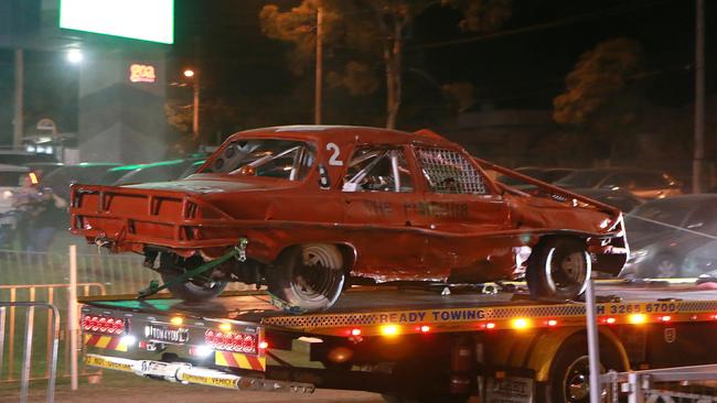 The car involved in the accident being towed from the scene. (AAP/Image Sarah Marshall)