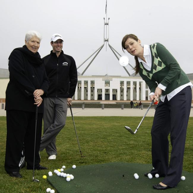 Playing golf with former Olympian Dawn Fraser and Golf Pro Jake Nagle outside Parliament House.