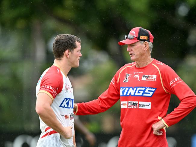 BRISBANE, AUSTRALIA - JANUARY 24: Coach Wayne Bennett chats with Tom Gilbert during a Dolphins NRL training session at Kayo Stadium on January 24, 2023 in Brisbane, Australia. (Photo by Bradley Kanaris/Getty Images)